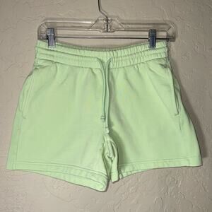 Aritzia Tna cozy A fleece high waist drawstring lounge shorts.